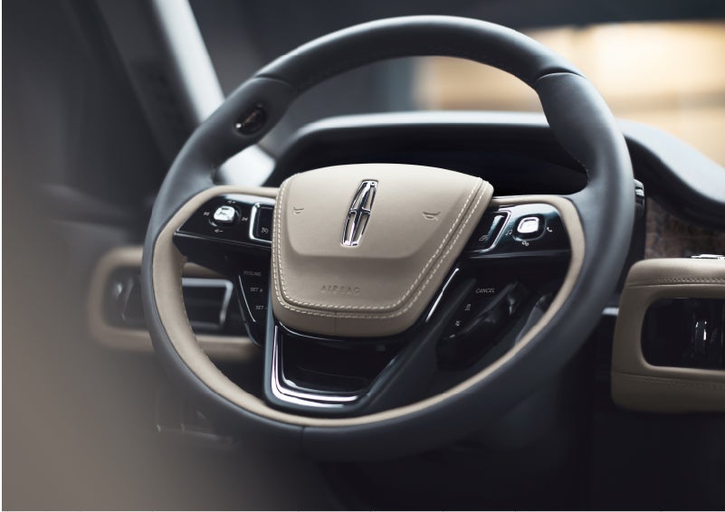The intuitively placed controls of the steering wheel on a 2023 Lincoln Aviator® SUV | Cummins Lincoln in Weatherford OK