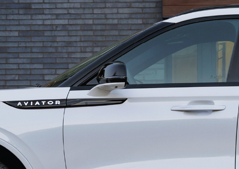 The driver’s door of a white 2025 Lincoln Aviator® SUV is showcased. | Cummins Lincoln in Weatherford OK