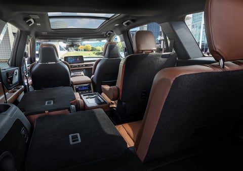The interior of the 2025 Lincoln Aviator® SUV is shown with two seats folded down for added space. | Cummins Lincoln in Weatherford OK
