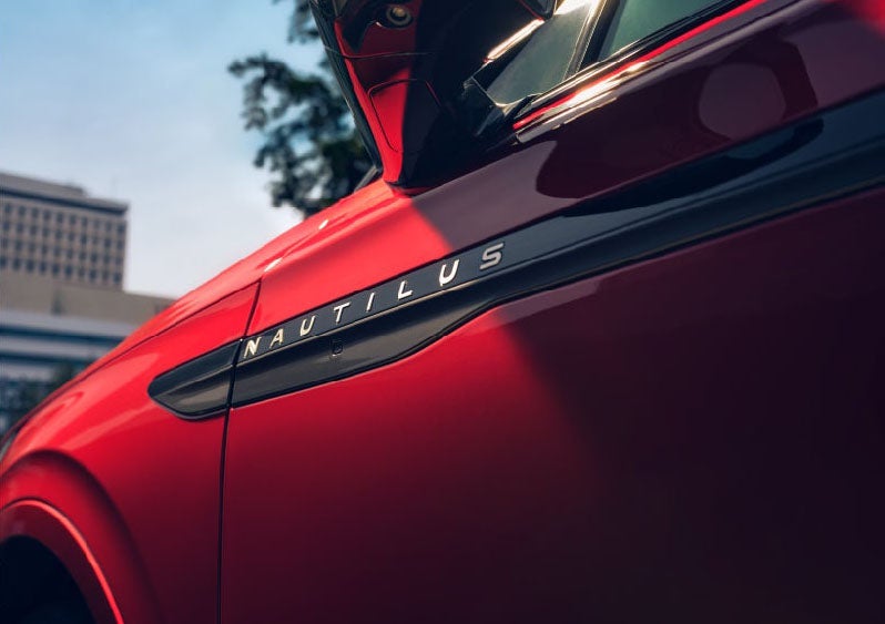 A side badge on the passenger door reads Nautilus. | Cummins Lincoln in Weatherford OK