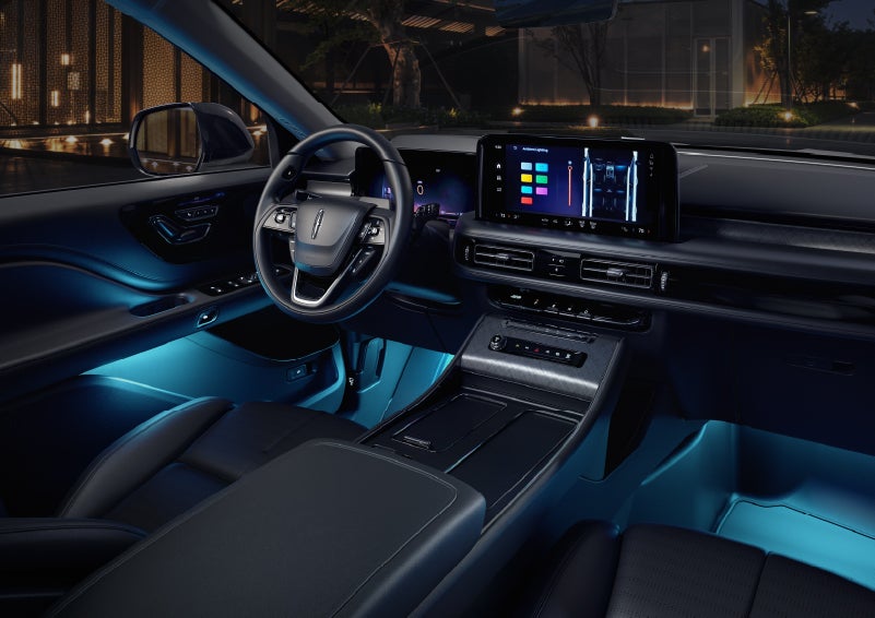 Deep blue ambient lighting glows from various places within a 2026 Lincoln Aviator® SUV. | Cummins Lincoln in Weatherford OK