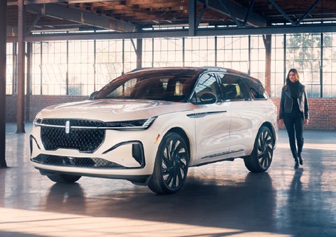 A person approaches a 2026 Lincoln Nautilus® SUV. | Cummins Lincoln in Weatherford OK