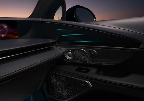 Selectable ambient lighting glows in the passenger door panel. | Cummins Lincoln in Weatherford OK