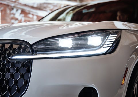 A close-up of a headlamp on the 2027 Lincoln Aviator® SUV is shown. | Cummins Lincoln in Weatherford OK